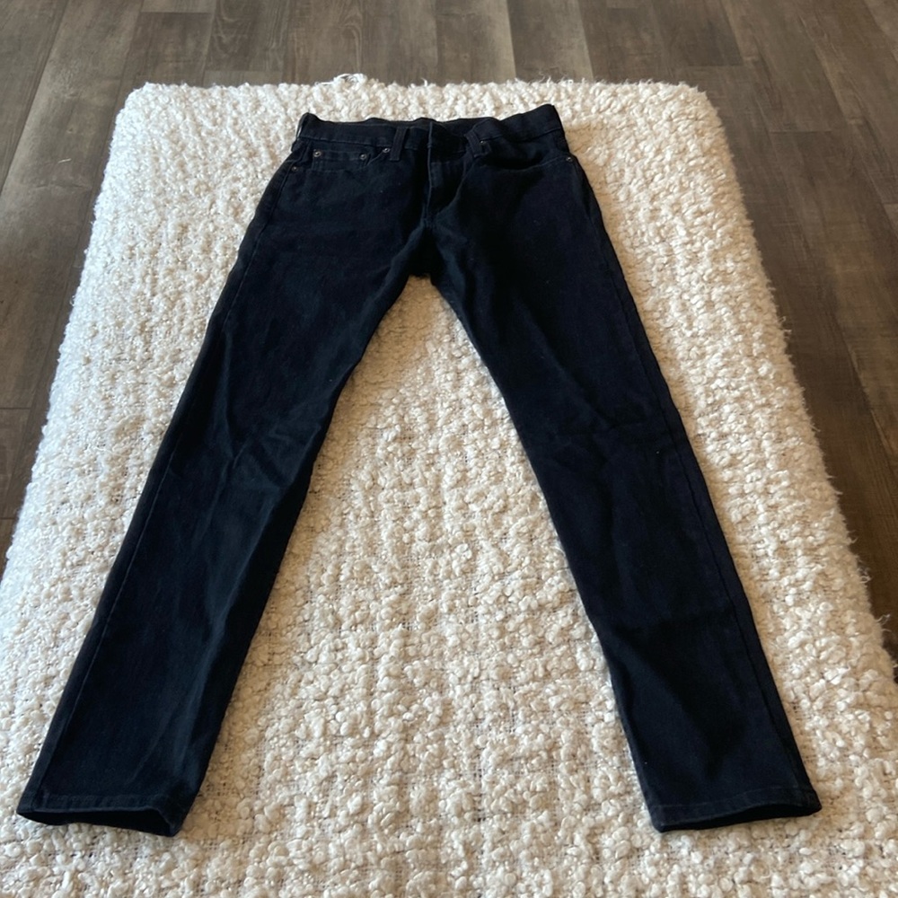 Levi’s 512 , black jeans.